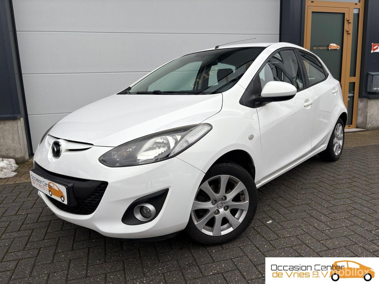 Mazda 2 - 1.3 5drsAircoNavi/CarplayStoelverwarmVelgenBluetooth - AutoWereld.nl