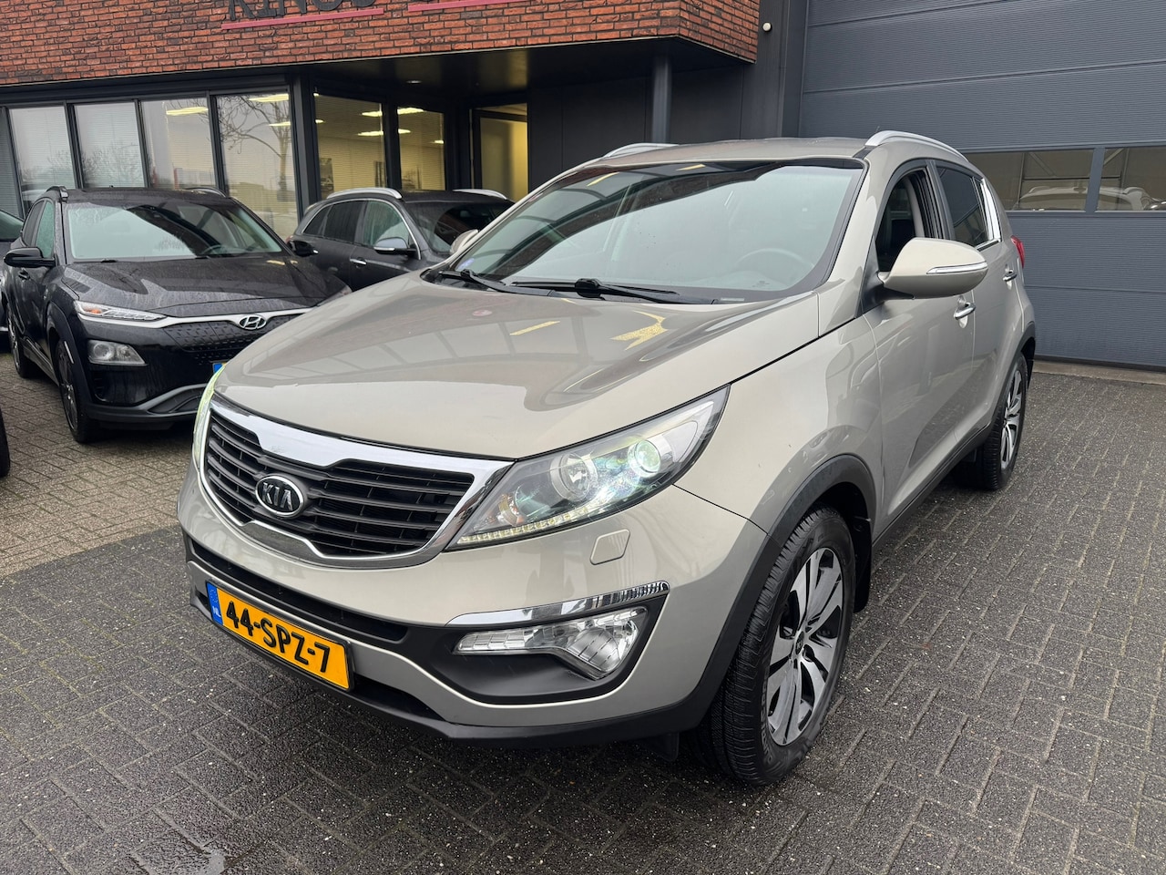 Kia Sportage - 2.0 X-clusive LED XENON CRUISE TREKHAAK PDC ORIG NL NAP - AutoWereld.nl