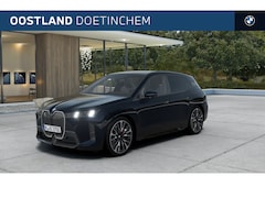 BMW iX - xDrive60 M Sport / Panoramadak Sky Lounge / Trekhaak / Bowers & Wilkins / M Multifunctione
