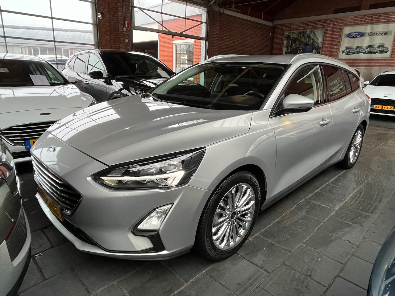 Ford Focus Wagon - 1.0 EcoBoost Titanium Business | Trekhaak | Apple Carplay/Android Auto|telefoonintegratie - AutoWereld.nl
