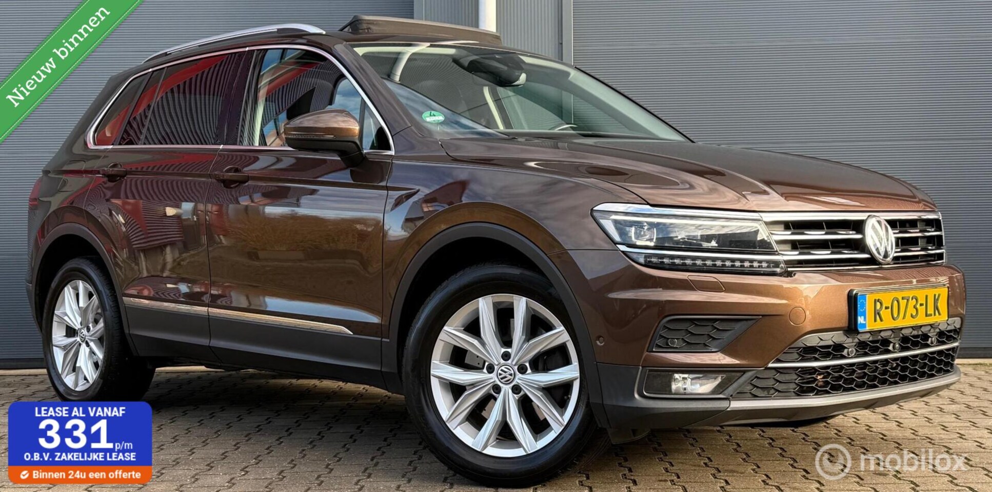 Volkswagen Tiguan - 2.0 TSI 4Motion Highline Pano.dak/Trekhaak/LED - AutoWereld.nl