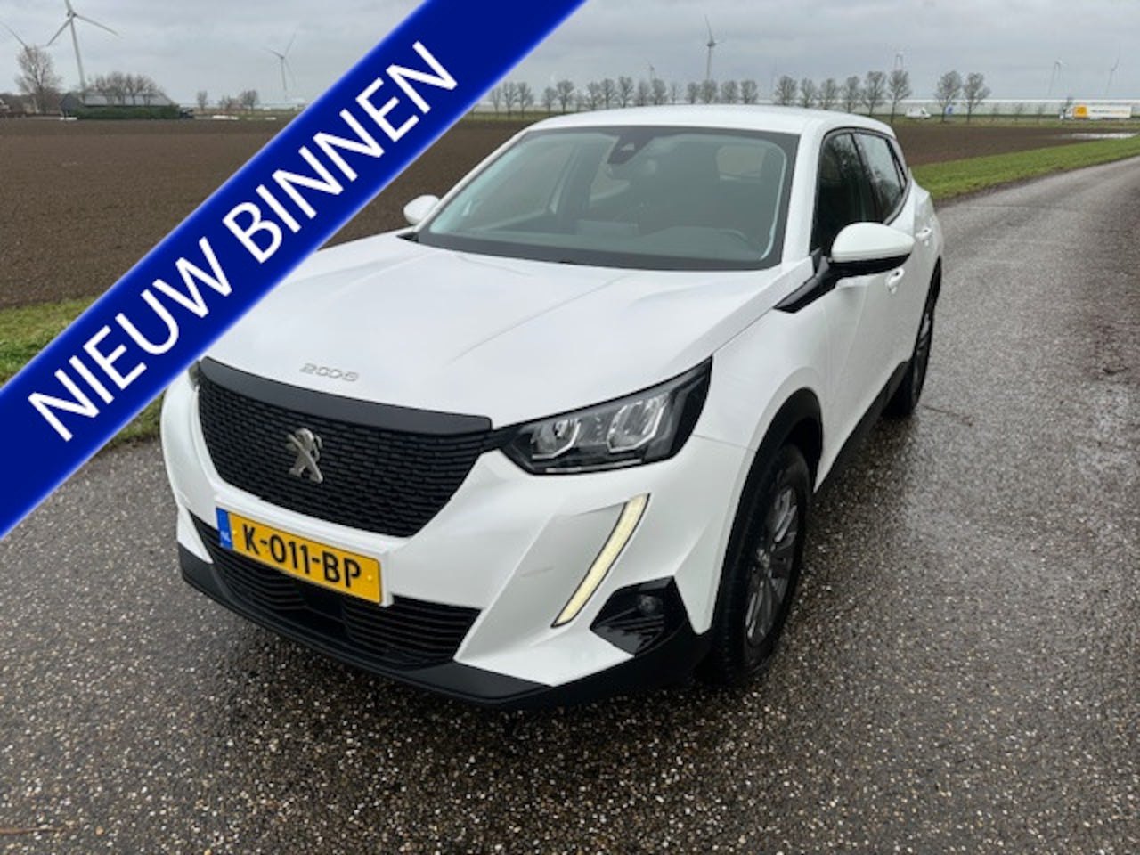 Peugeot 2008 - 1.2 PureTech Blue Lease Active Navi LMV Pdc Enz - AutoWereld.nl