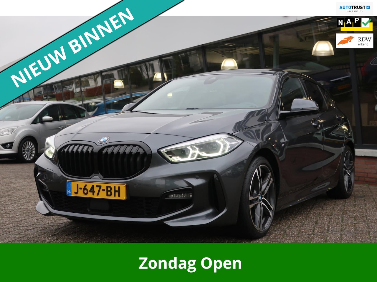 BMW 1-serie - 118i High Exe. Edit. M-Sport 1e EIG_PANO_LEDER_CAM_NAP. - AutoWereld.nl