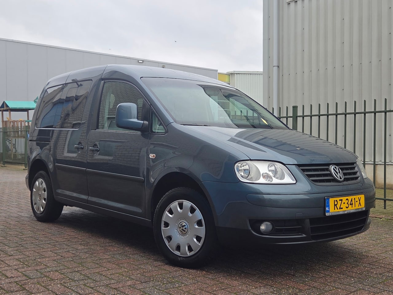 Volkswagen Caddy - 1.4 Family 5 Persoon-Airco-2xSchuifdeur - AutoWereld.nl