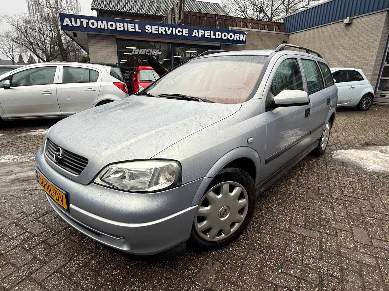 Opel Astra Wagon - 1.6-16V Comfort AUTOMAAT *APK*AIRCO*ELEKTR. RAMEN*TREKHAAK*STUURBEKR.* - AutoWereld.nl