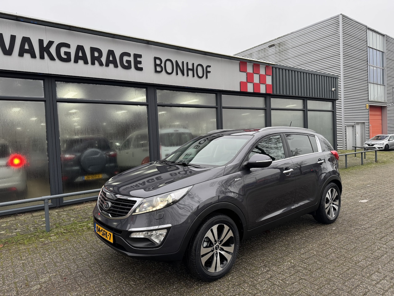 Kia Sportage - 2.0 X-clusive 4wd AUTOMAAT-LEER-CLIMA - AutoWereld.nl