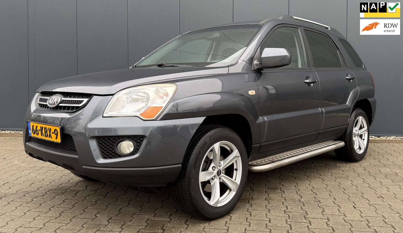 Kia Sportage - 2.0 CVVT X-ecutive 4WD Airco Cruise Trekhaak NAP APK - AutoWereld.nl