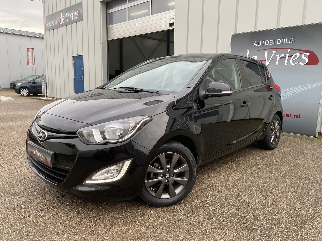 Hyundai i20 - 1.2 HP i-Motion Premium / Airco / Cruise / Stoelverw. / LMV - AutoWereld.nl