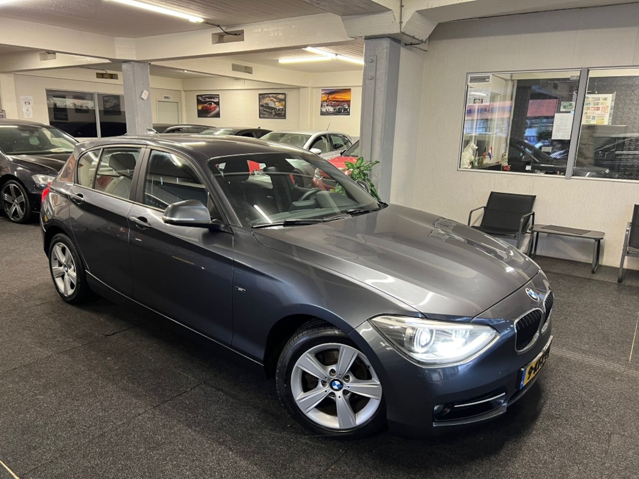 BMW 1-serie - 114i F20 *NAP*5drs*NAVI*Xenon*Velgen* - AutoWereld.nl
