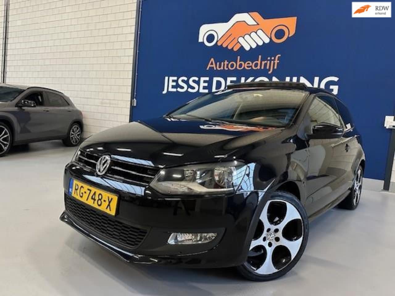 Volkswagen Polo - 1.2 TSI Comfortline / bj.2012 / kleur:zwart/ panoramadak / airco/ sportvelgen/APK 11/2026 - AutoWereld.nl