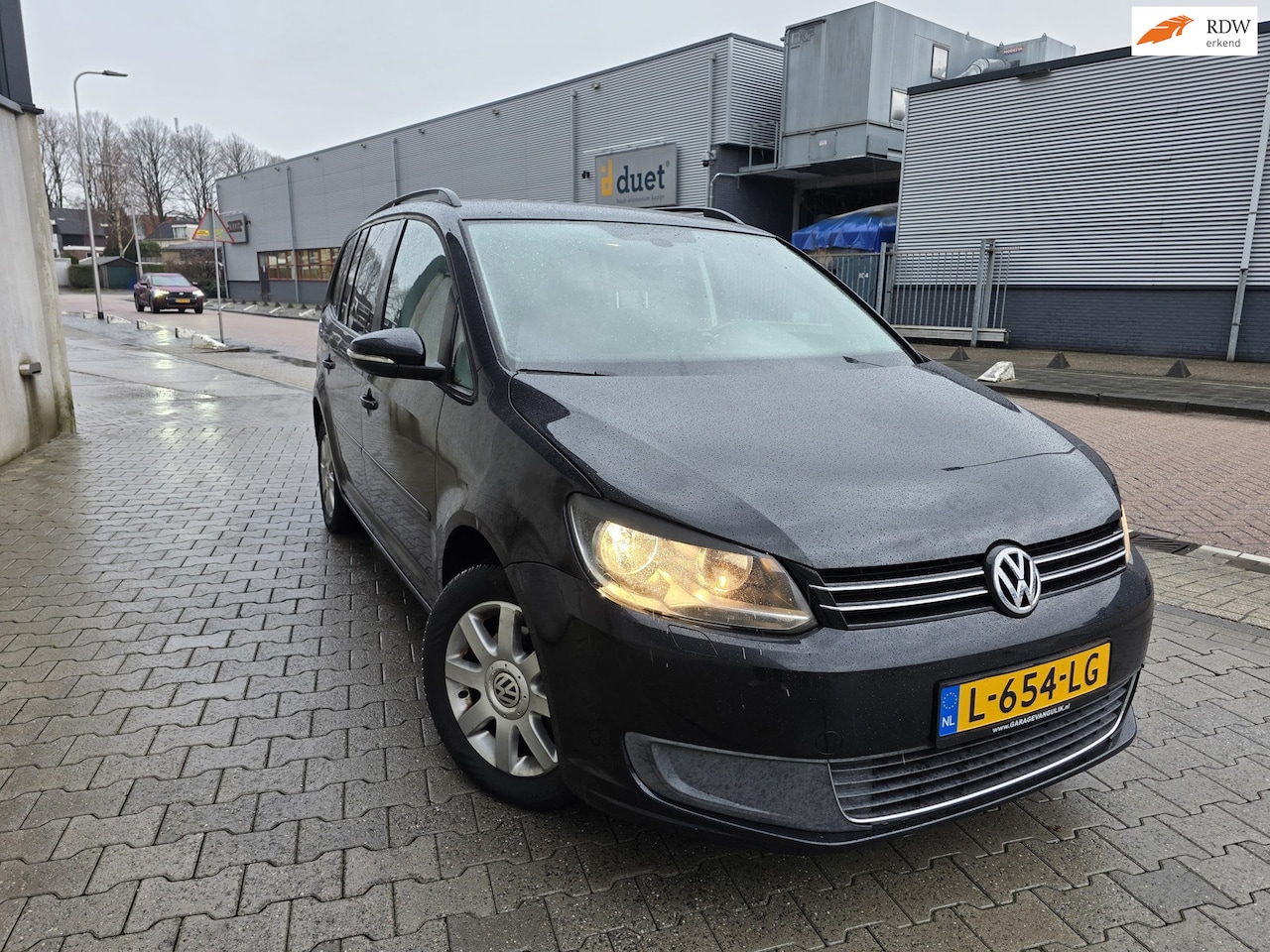Volkswagen Touran - 1.4 TSI Highline 7p AUTOMAAT NEW Ketting APK 12 2026 - AutoWereld.nl