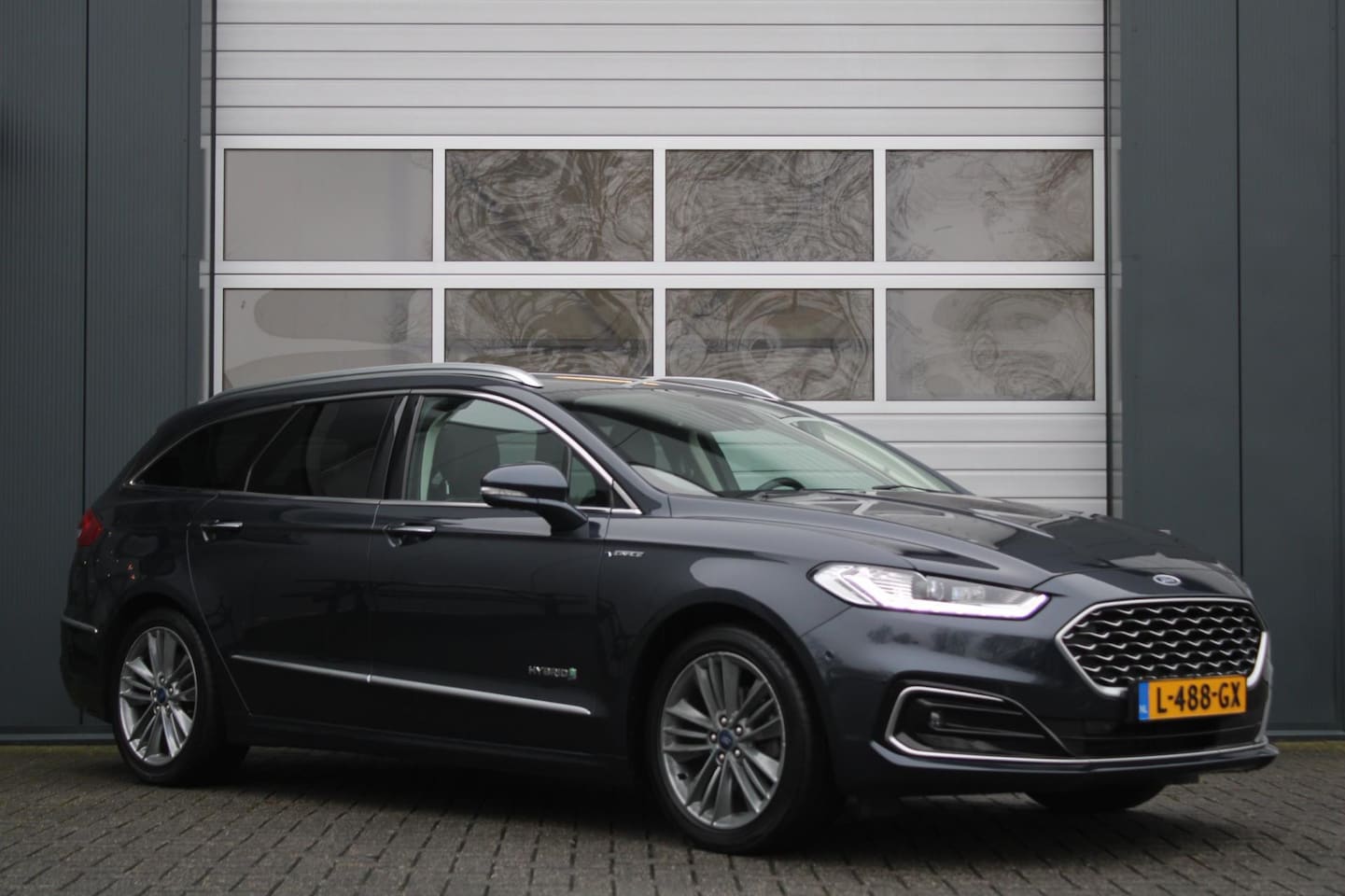 Ford Mondeo Wagon - 2.0 IVCT HEV Vignale Cruise/Camera/Stoelverwarming/Keyless/Leder/PDC/Navi/Bluetooth/LED/18 - AutoWereld.nl