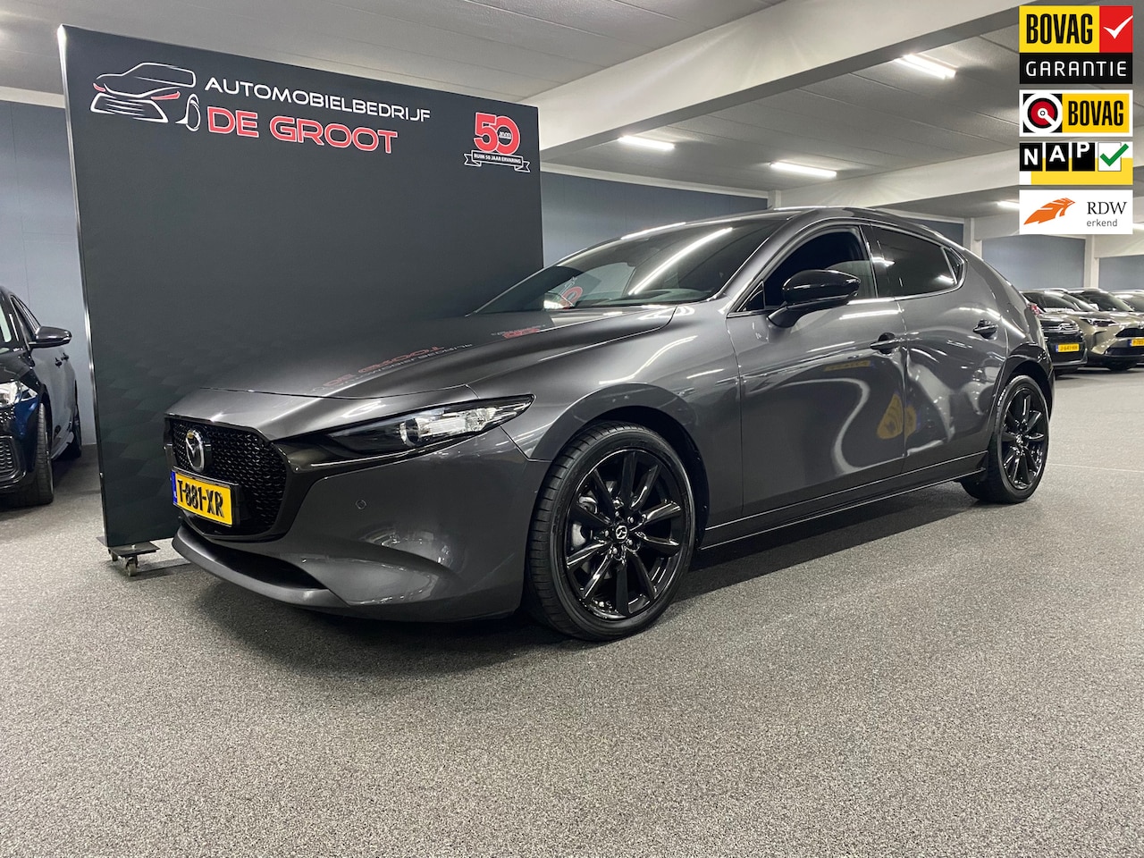 Mazda 3 - 2.0 e-SkyActiv-G M Hybrid 150 Homura/ Nederlandse auto/ Parkeersensoren/ Achteruitrijcamer - AutoWereld.nl