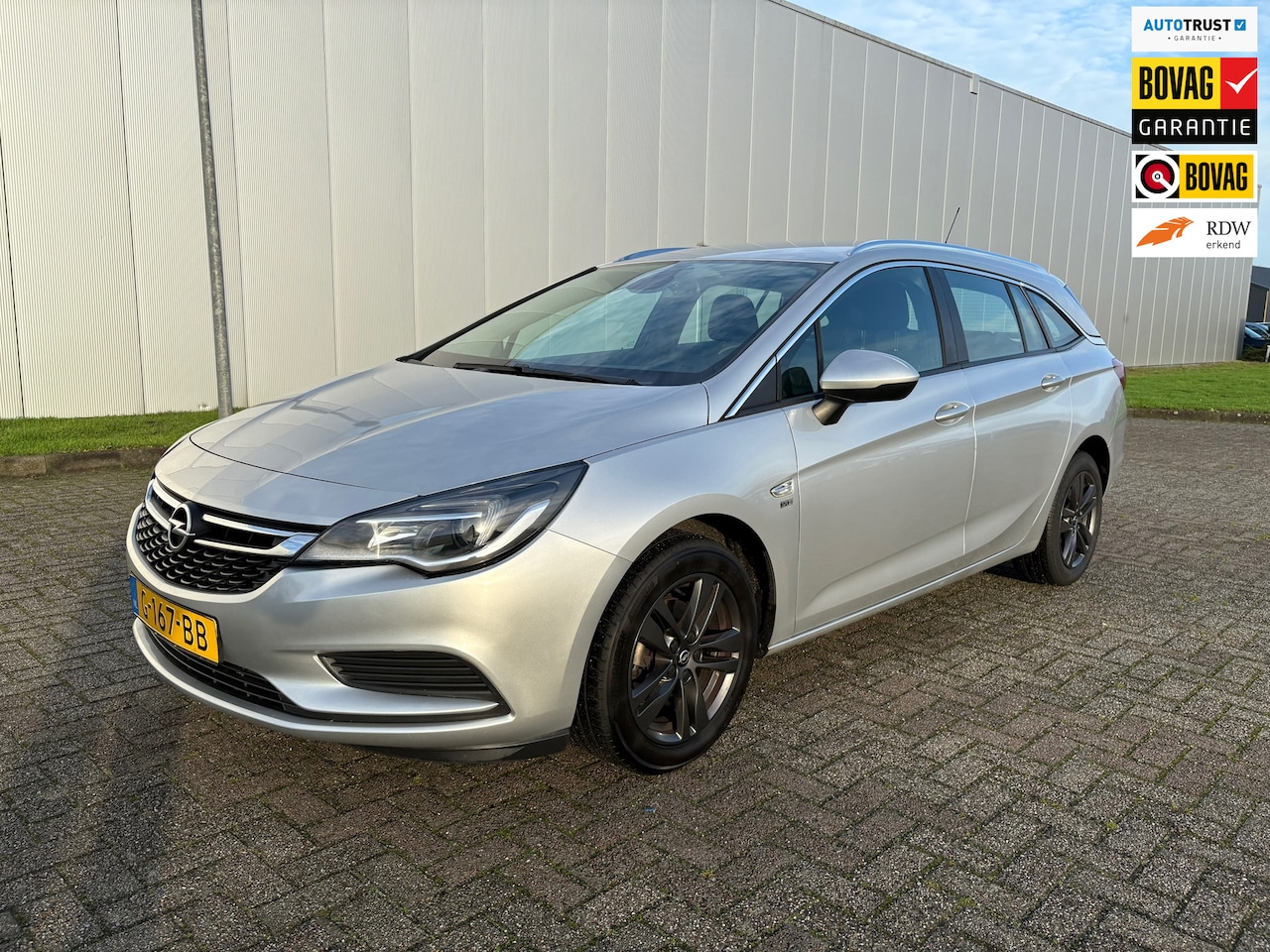 Opel Astra Sports Tourer - 1.0 Turbo 120 Jaar Edition 1.0 Turbo 120 Jaar Edition , Airco, Navigatie - AutoWereld.nl