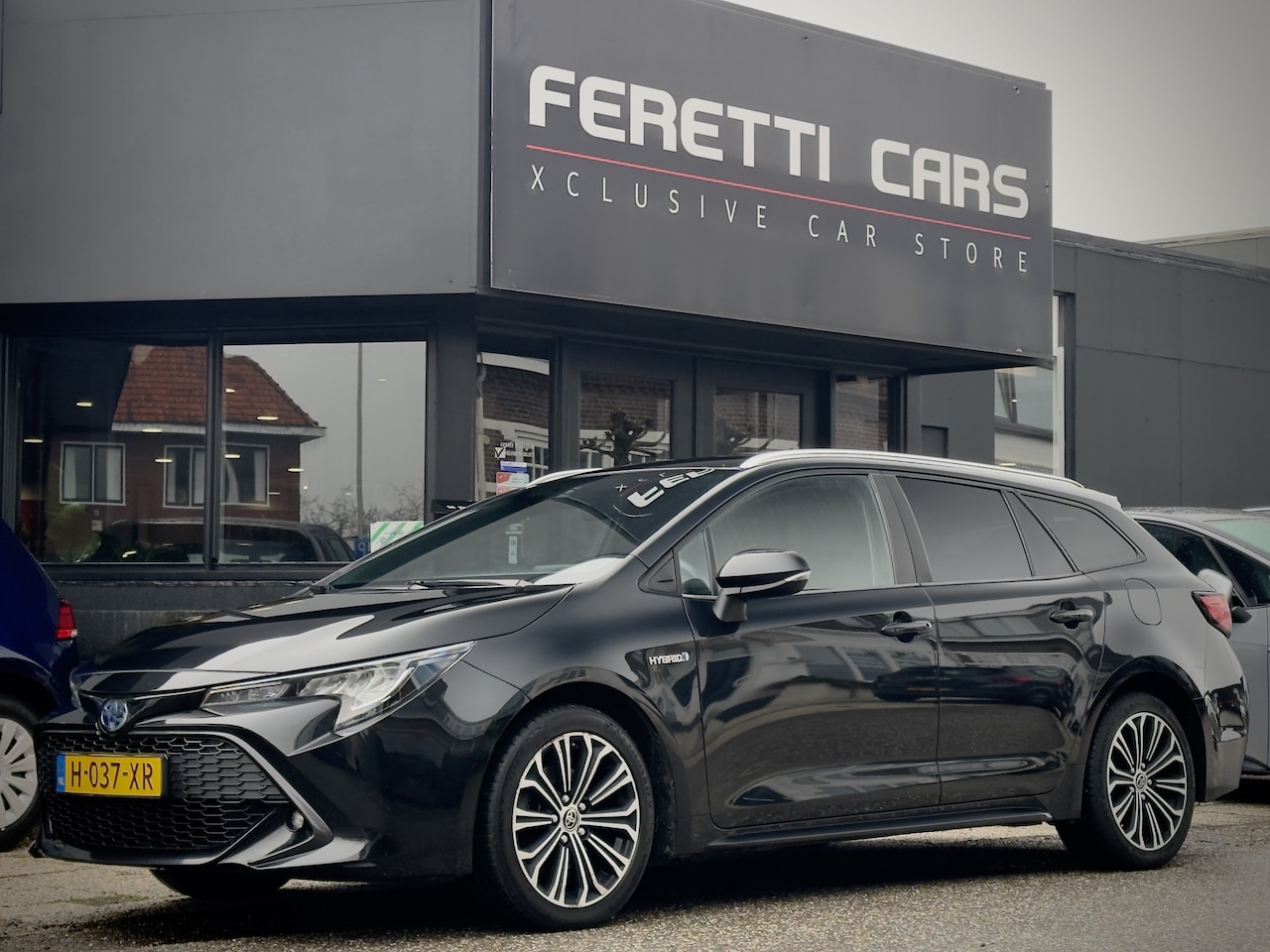 Toyota Corolla Touring Sports - 2.0 HYBRID PLUS NAVI CAMERA APPLE-CARPLAY LED LMV PDC - AutoWereld.nl