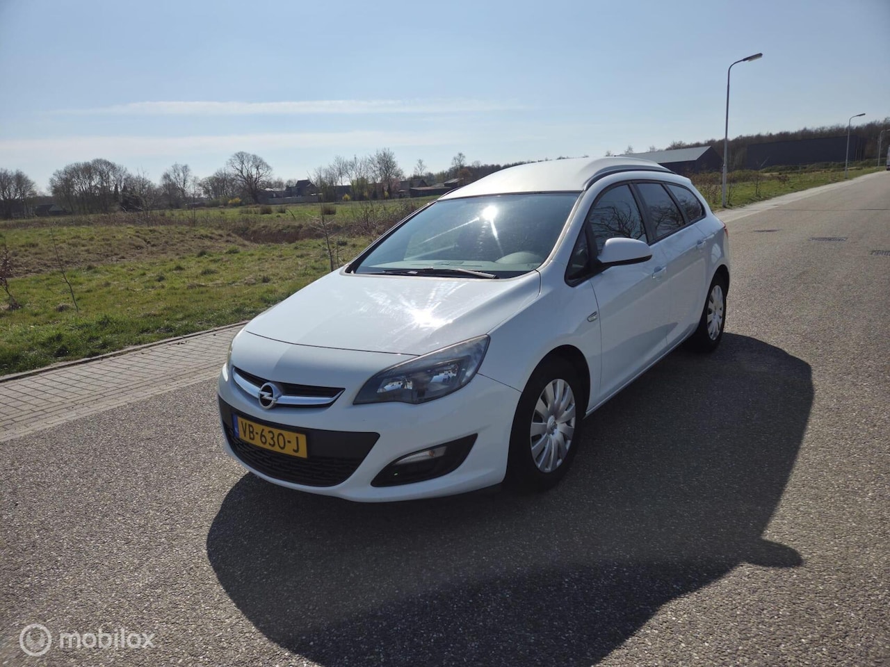 Opel Astra Sports Tourer - 1.3 CDTi Edition Grijskenteken - AutoWereld.nl
