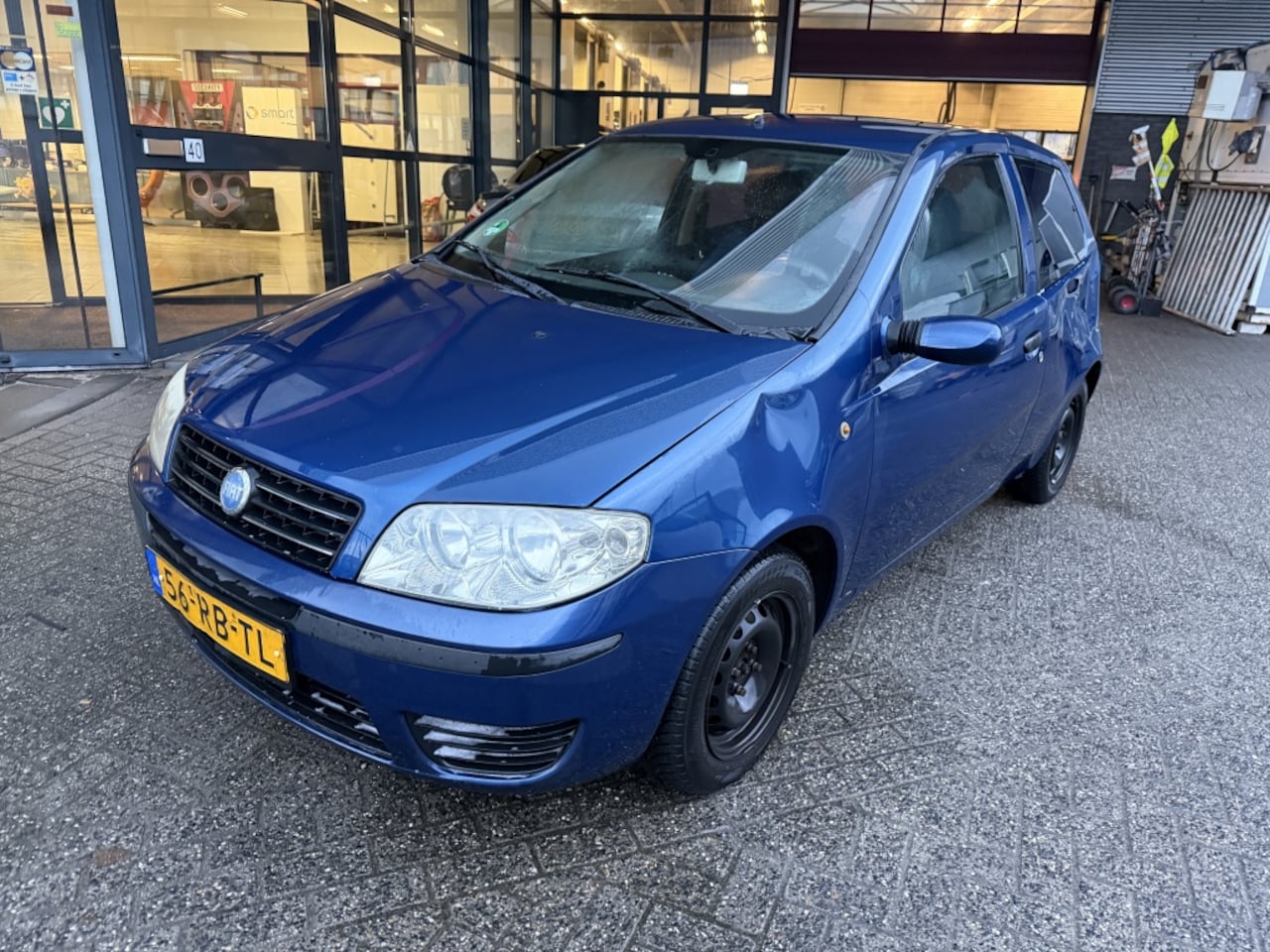 Fiat Punto - 1.4-16V Young 1.4-16V Young - AutoWereld.nl