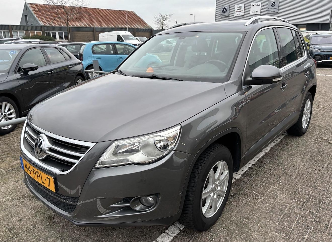 Volkswagen Tiguan - 1.4 TSI Sport&Style - AutoWereld.nl