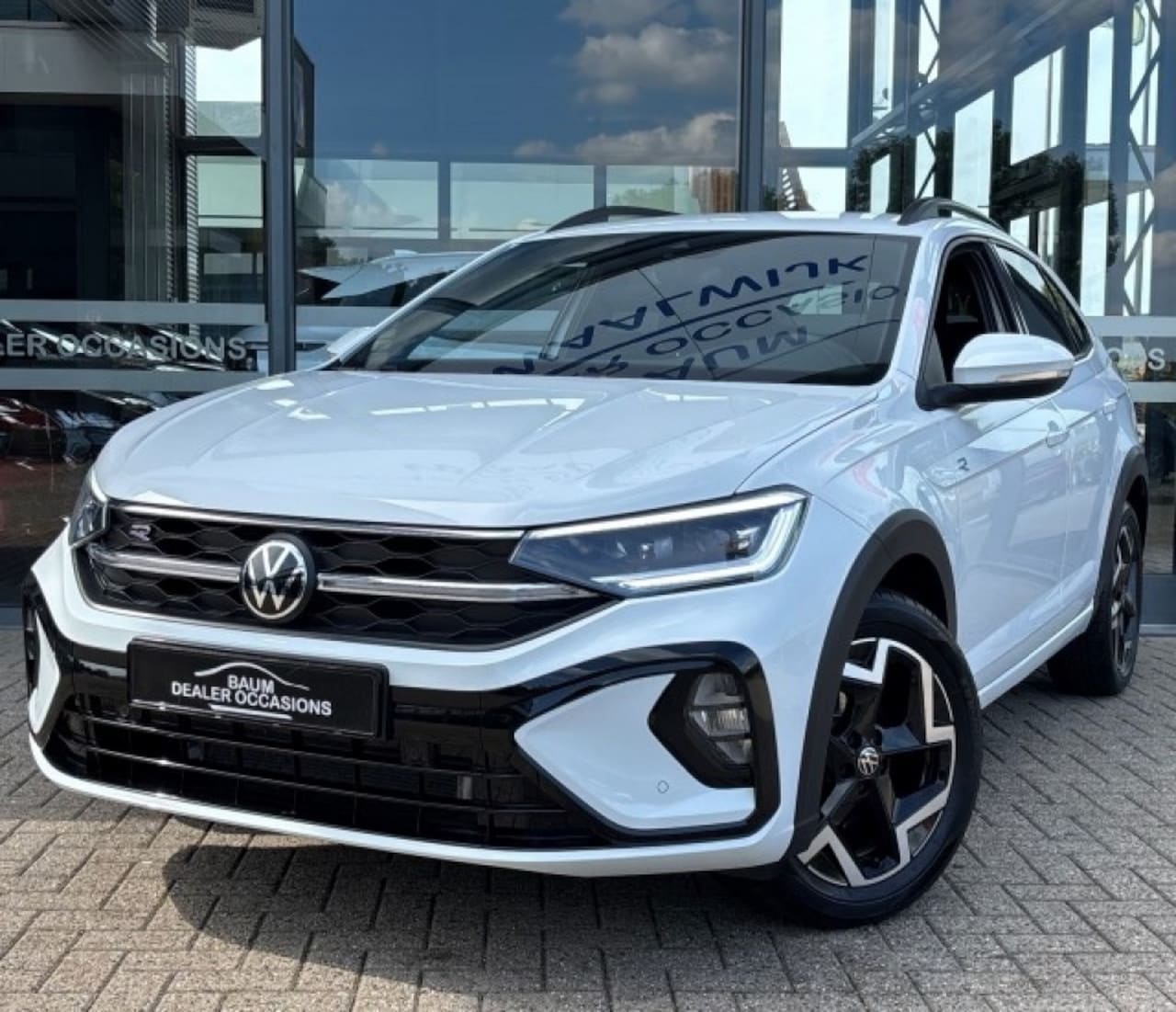 Volkswagen Taigo - 1.0 TSI R-LINE AIRCO NAVI CARPLAY PDC STOELVERW. - AutoWereld.nl