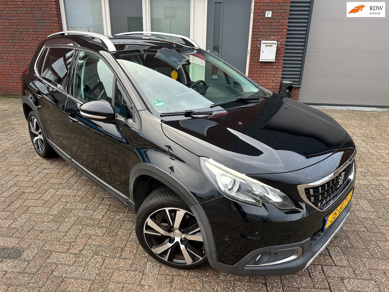 Peugeot 2008 - 1.2 PureTech Allure / Navi / Leder / PDC / AUT - AutoWereld.nl
