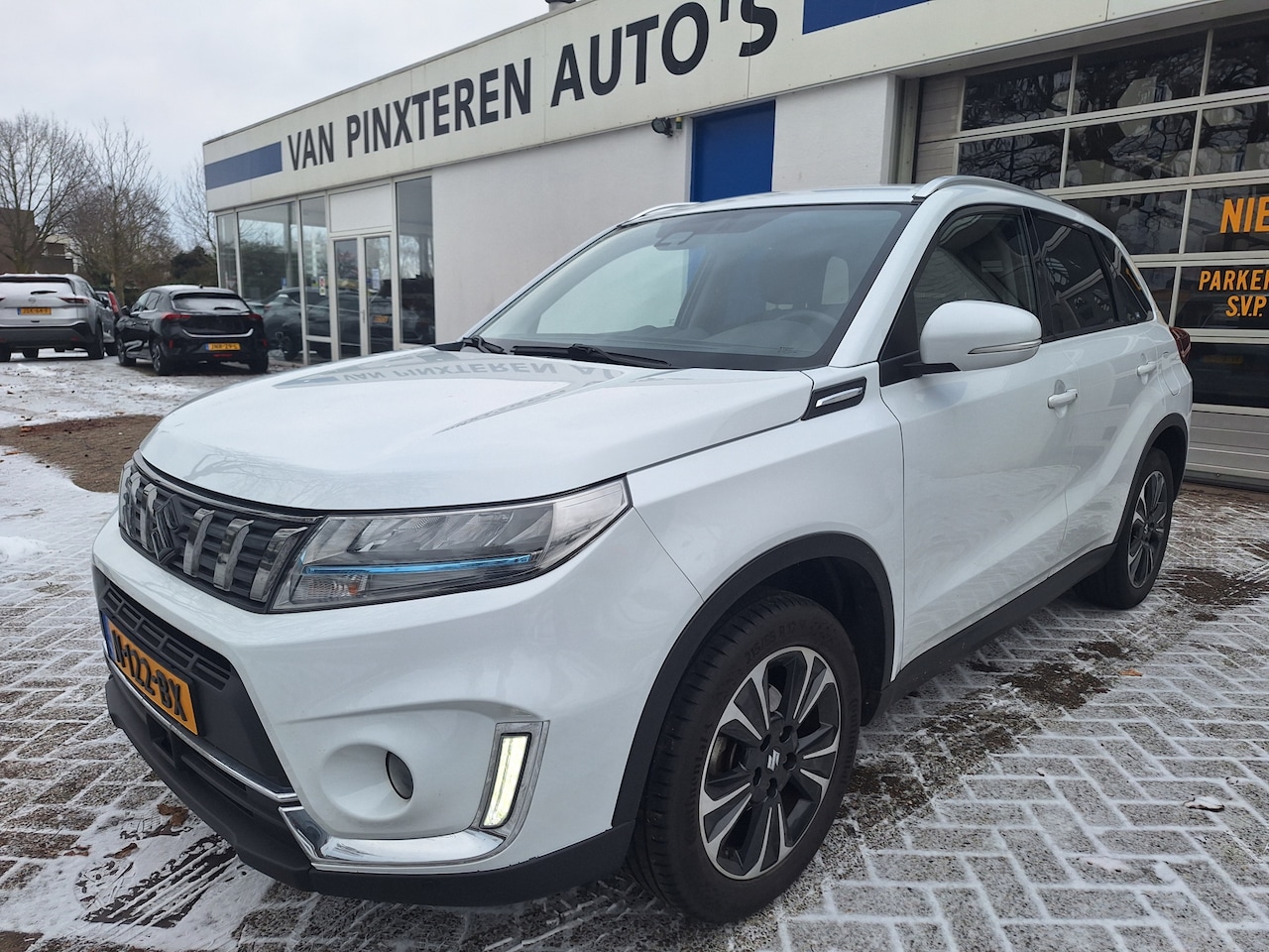 Suzuki Vitara - 1.4 Boosterjet Style Smart Hybrid TREKHAAK - AutoWereld.nl