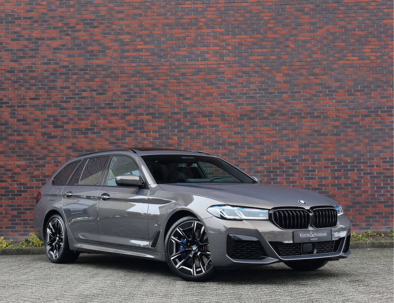 BMW 5-serie - 540i xDrive | M sport Pro - Achteras besturing - AutoWereld.nl