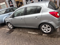 Opel Corsa - 1.2-16V Cosmo_onder schade