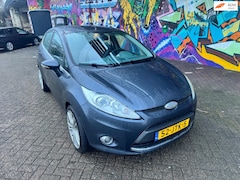 Ford Fiesta - 1.25 Ghia dikke 17 inch velgen airco stereo orig Nederlands 5 deuren boeken aanwezig rijd