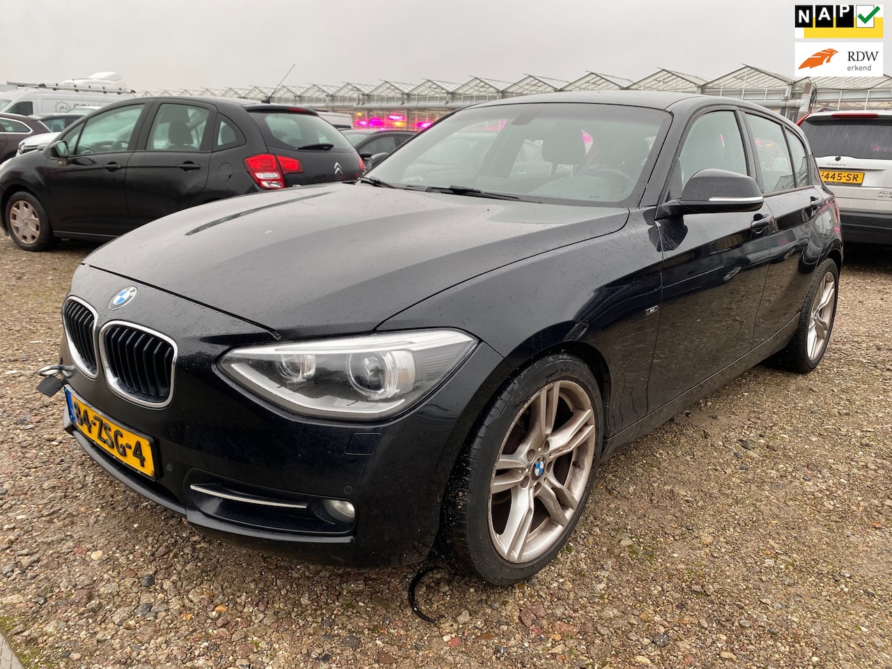 BMW 1-serie - 116i Upgrade Edition *AUTOMAAT* EXPORT OF HANDEL * - AutoWereld.nl