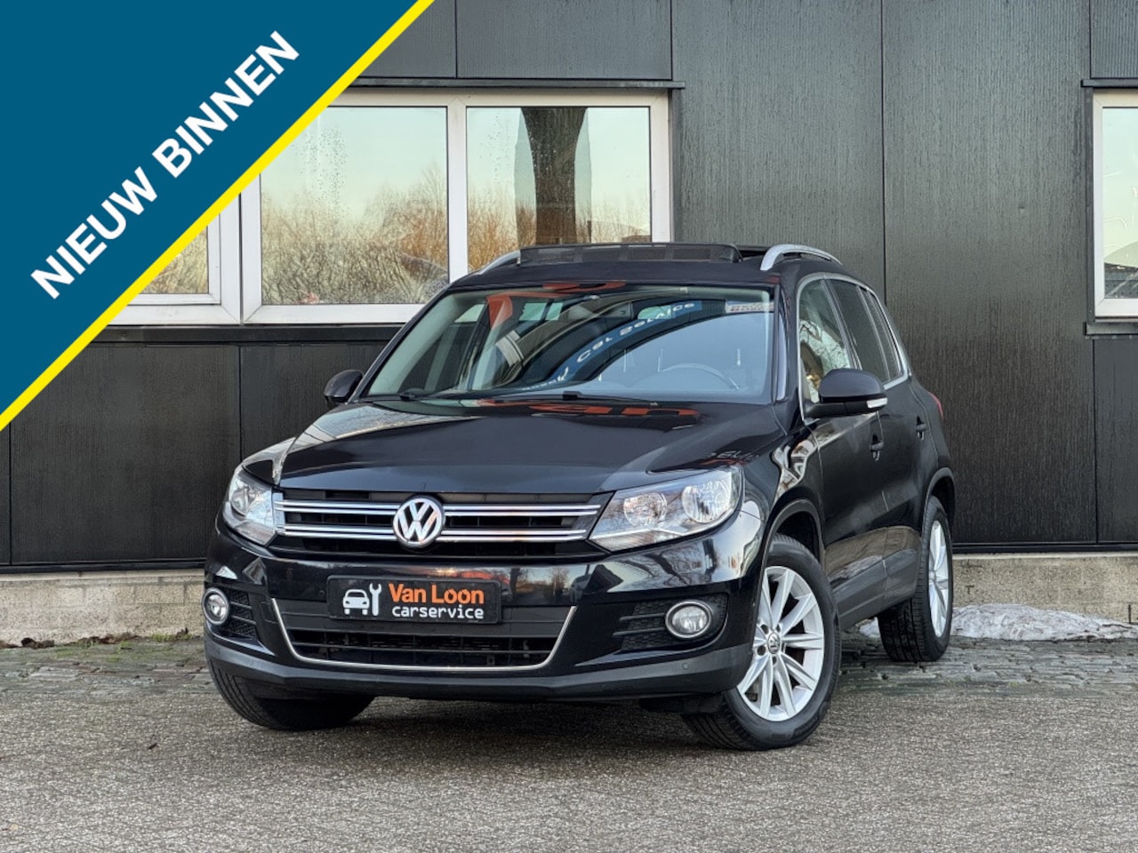 Volkswagen Tiguan - 1.4 TSI Sport & Style/Leder/Elek stoel/Navigatie/stoelverw/Trekh - AutoWereld.nl