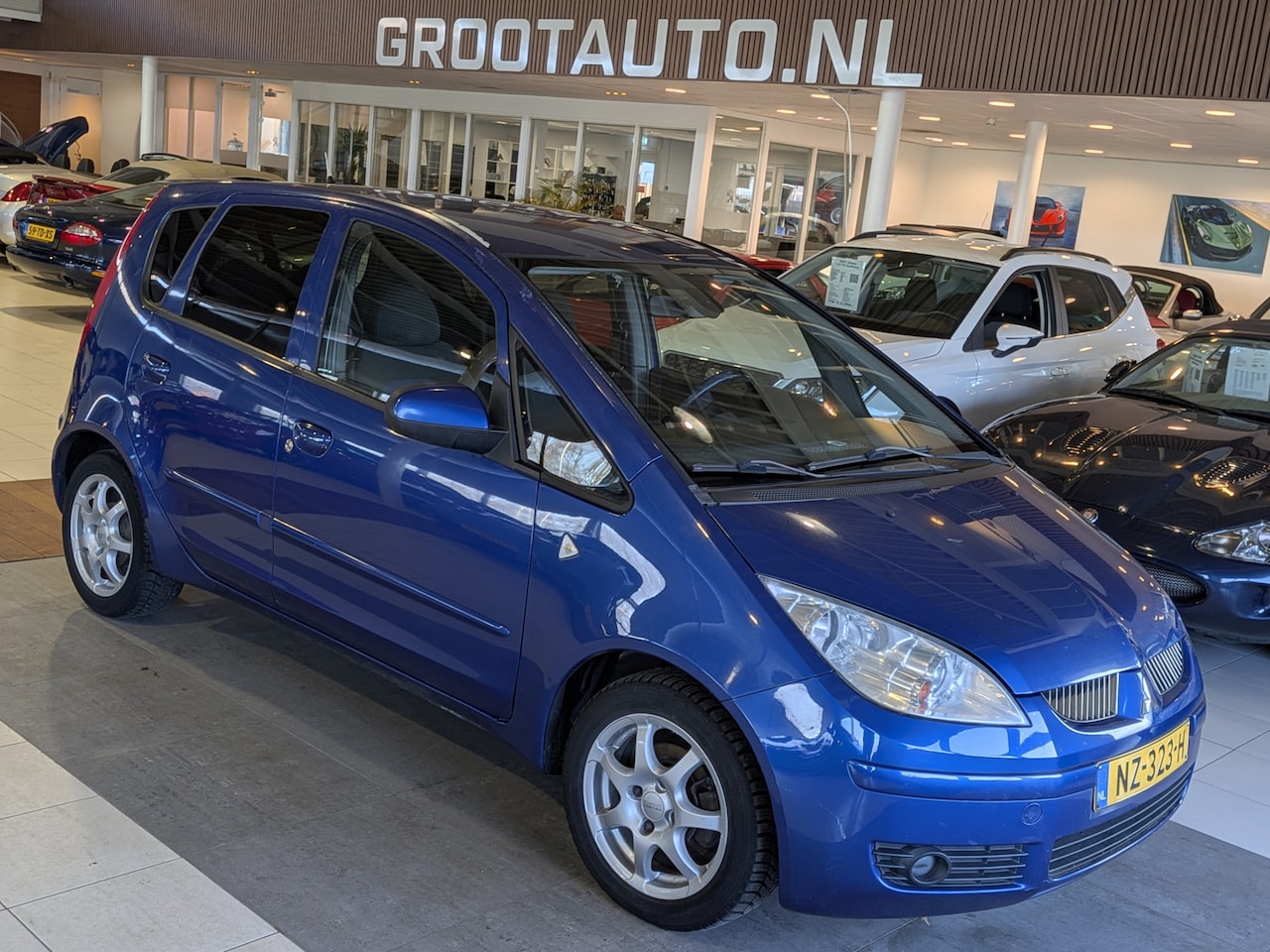 Mitsubishi Colt - 1.3 Invite Airco, Stuurbekrachtiging - AutoWereld.nl