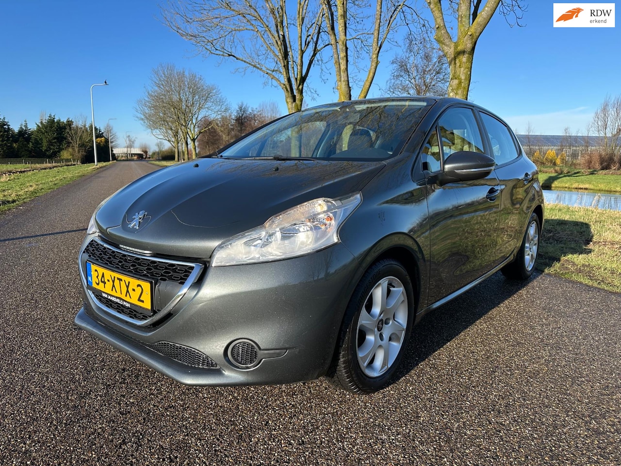 Peugeot 208 - 1.2 VTi|dealer onderhouden|rijdt goed - AutoWereld.nl