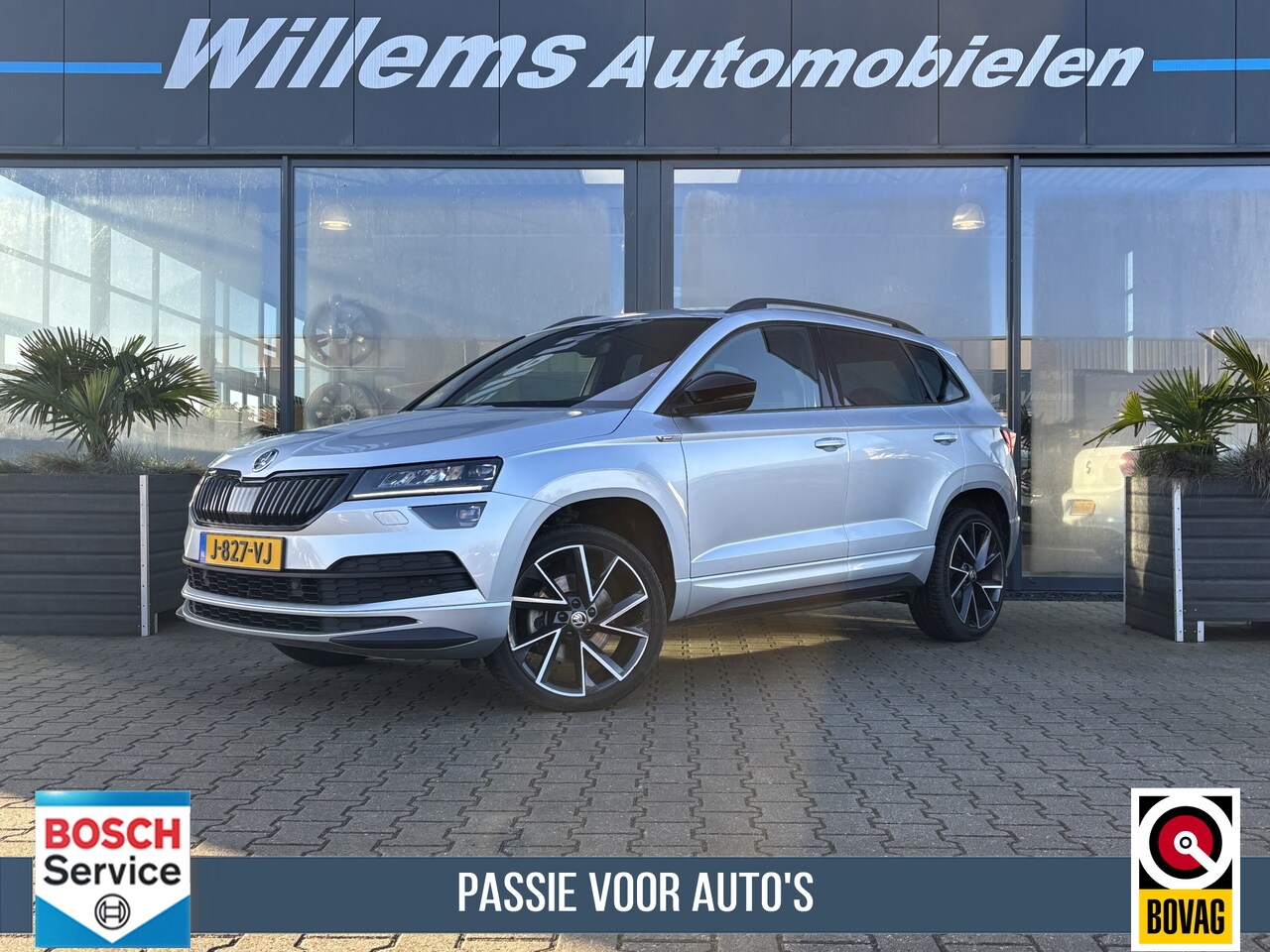 Skoda Karoq - 1.5 TSI ACT Sportline Business Camera, Stoelverwarming & Elektrische Kofferklep - AutoWereld.nl