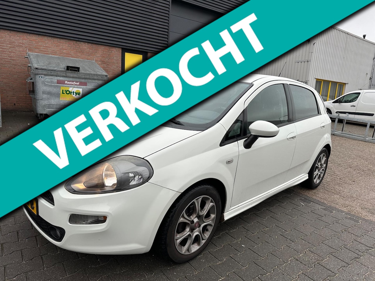Fiat Punto Evo - 1.3 M-Jet Lounge 1.3 M-Jet Lounge - AutoWereld.nl