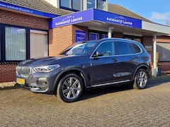 BMW X5 - XDrive45e High Executive H&K Panorama Laser Trekhaak Head Up Comfortstoelen ACC Warmte-com