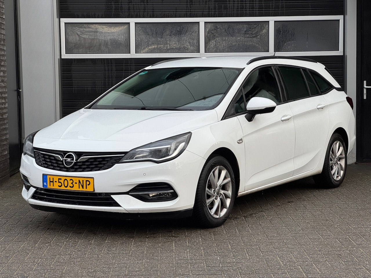 Opel Astra Sports Tourer - 1.2 Edition LEES ADVERTENTIE - AutoWereld.nl