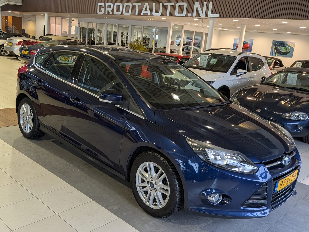 Ford Focus - 1.0 EcoBoost Titanium Airco, Cruise Control, Trekhaak, Stuurbekrachtiging - AutoWereld.nl