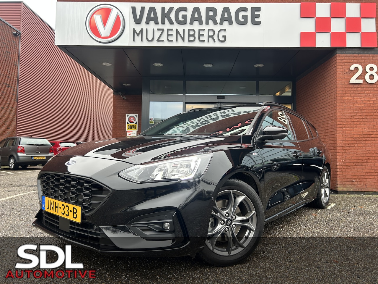 Ford Focus Wagon - 1.0 EcoBoost 125PK ST Line Business // ADAPT. CRUISE // DODEHOEK // CLIMA // CAMERA+SENSOR - AutoWereld.nl