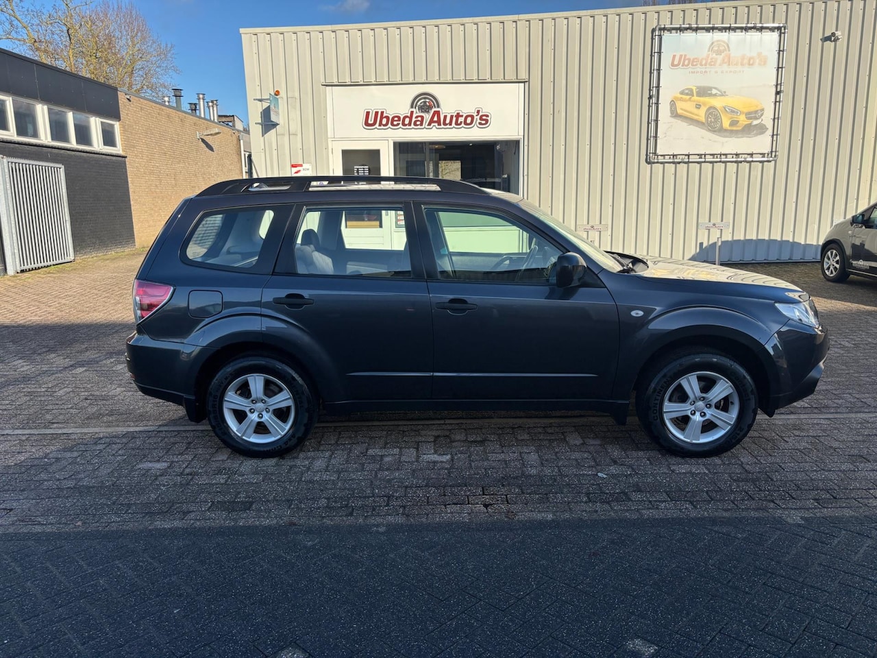 Subaru Forester - 2.0 Comfort 4X4 BENZ-LPG G3 4999E - AutoWereld.nl