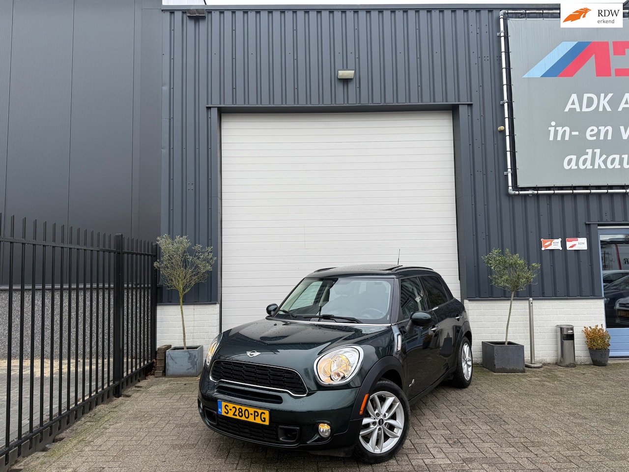 MINI Countryman - Mini 1.6 Cooper S ALL4 Champ Edition AUTOMAAT/PANO/LEDER - AutoWereld.nl