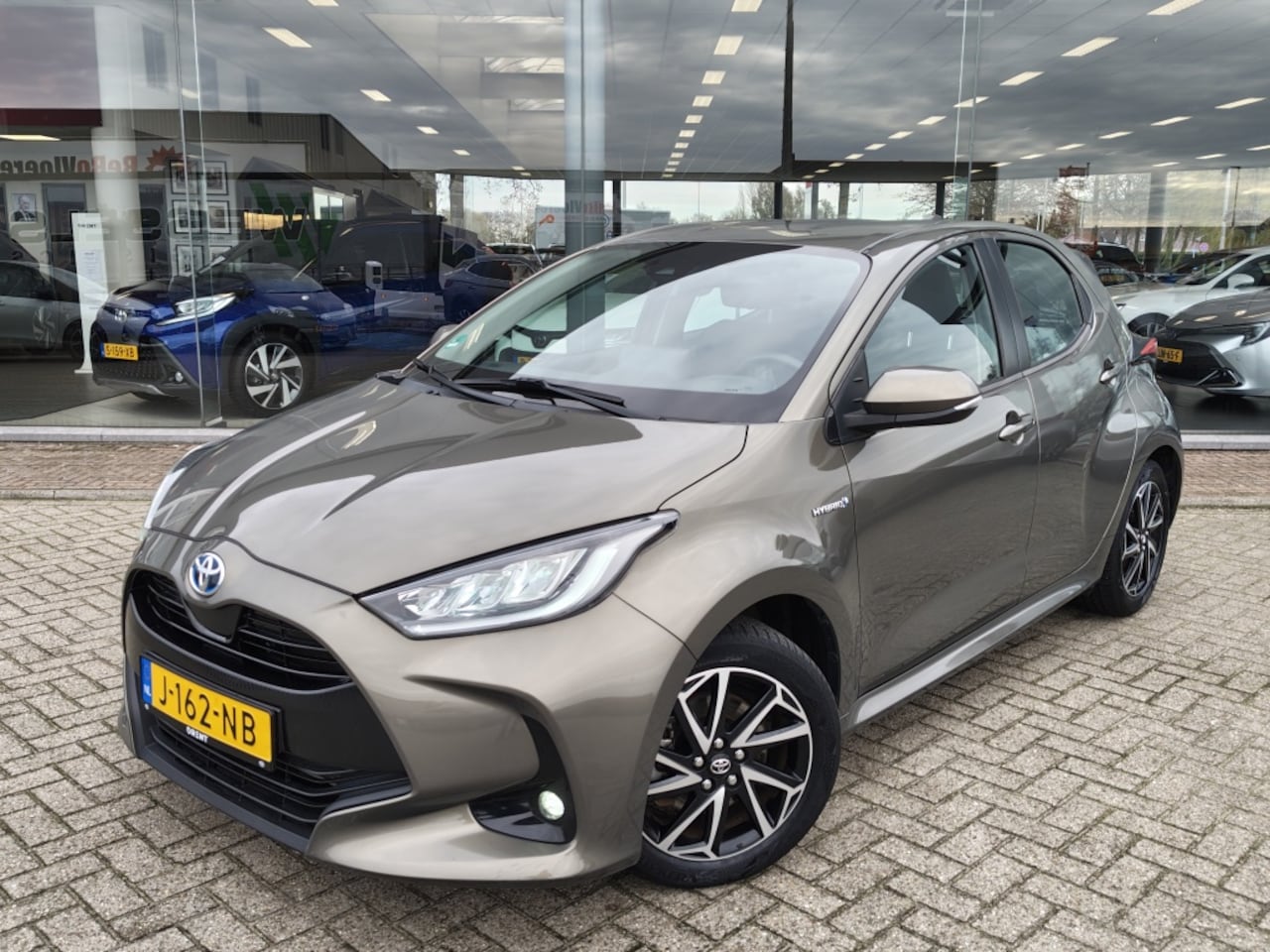 Toyota Yaris - 1.5 Hybrid First Edition | Navi | Keyless Start & Entry | Androi - AutoWereld.nl