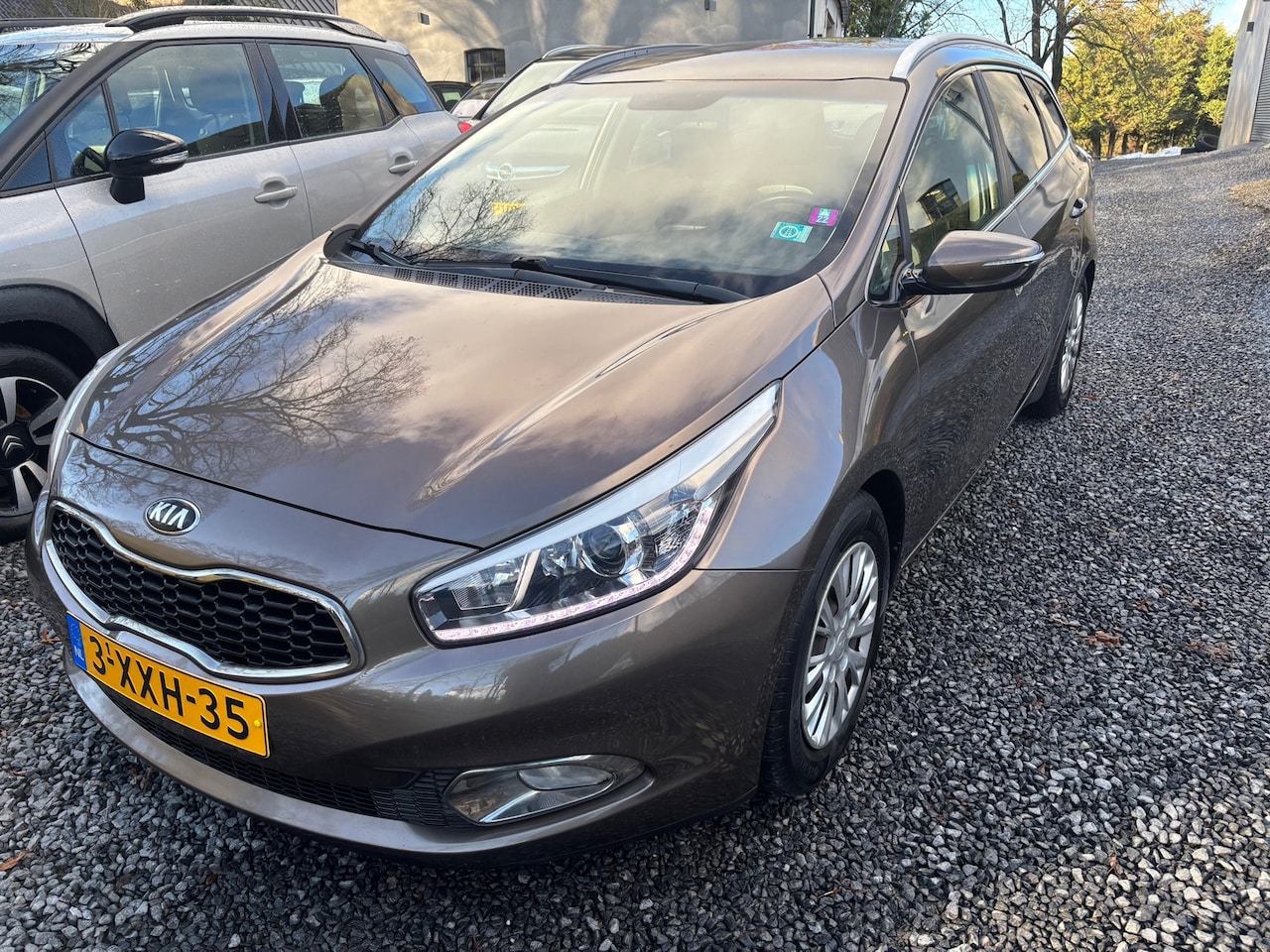 Kia Cee'd Sportswagon - 1.6 GDI BusinessLine AIRCO NAVIGATIE - AutoWereld.nl