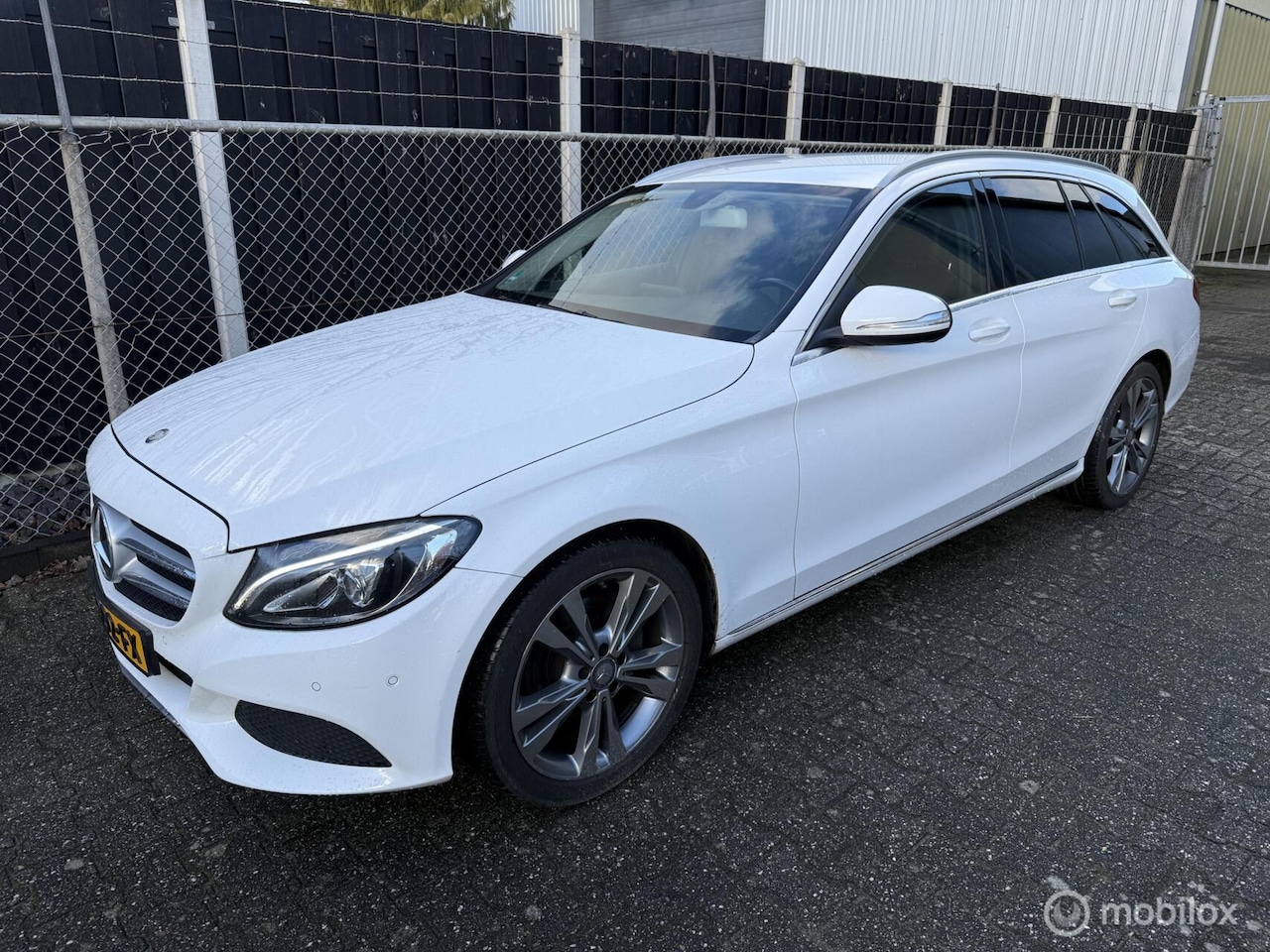 Mercedes-Benz C-klasse Estate - 180 pdc v+a-1/2 leer-navigatie - AutoWereld.nl