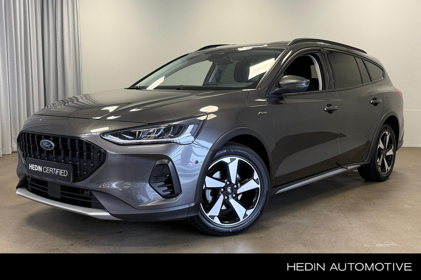 Ford Focus Wagon - 1.0 EcoBoost Hybrid 125pk Active | Stoel, Stuur & Voorruitverwarming | Achteruitrij Camera - AutoWereld.nl