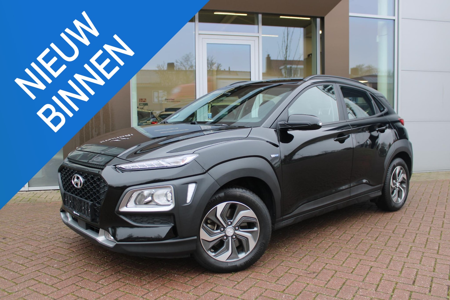 Hyundai Kona - 1.6 GDI HEV Comfort Automaat Hybrid Airco Carplay Camera Trekhaak 1.300kg - AutoWereld.nl