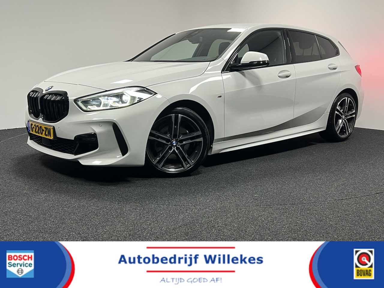 BMW 1-serie - 118i High Executive Edition | NAVI | STOELVERWARMING | LEDEREN BEKLEDING | PARKEERSENSOREN - AutoWereld.nl