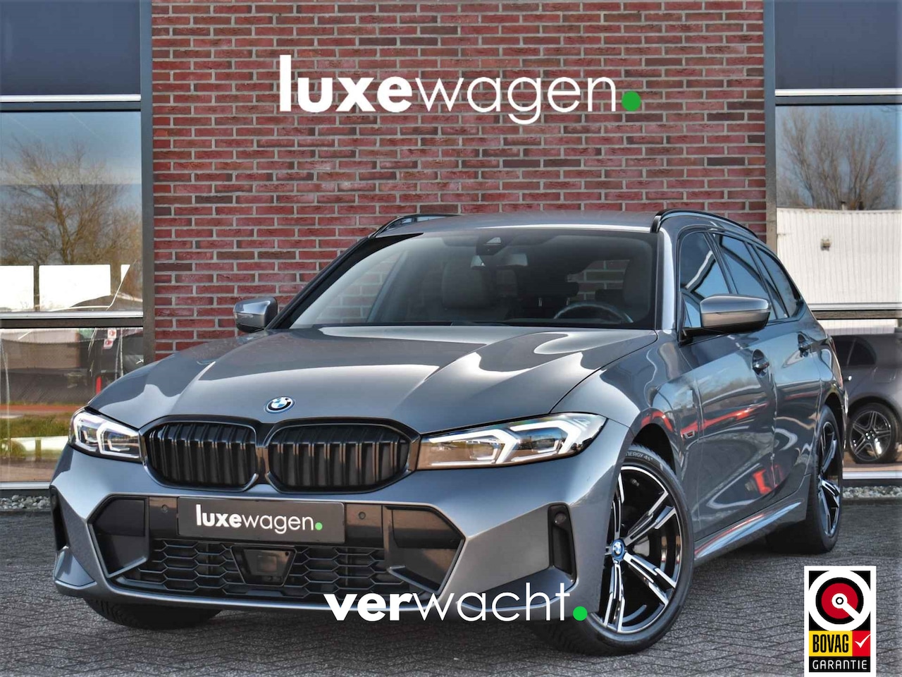 BMW 3-serie Touring - 320i M-Sport Pano - AutoWereld.nl