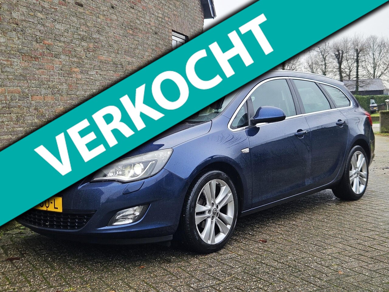 Opel Astra Sports Tourer - 1.4 Turbo Sport*Ketting vv*Rijklaar! - AutoWereld.nl