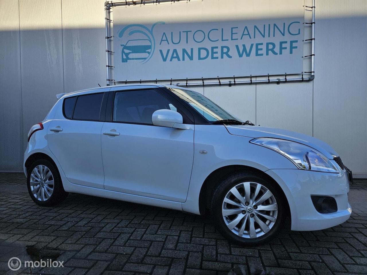 Suzuki Swift - 1.2 Bandit EASSS Parelmoer wit nette auto!! - AutoWereld.nl