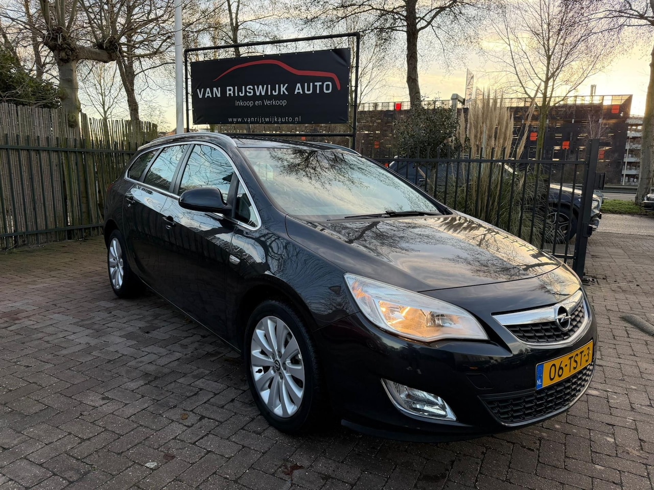 Opel Astra Sports Tourer - 1.4 Cosmo Nav Airco Cruise-con Trekh Leder Ex Bpm - AutoWereld.nl